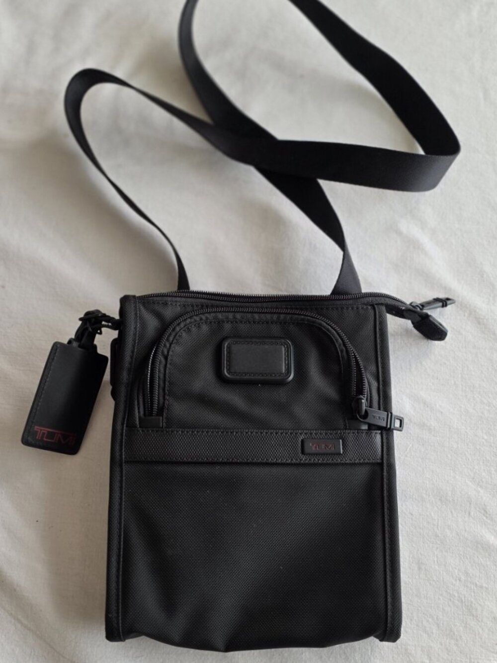 Tumi Black Pocket Bag Small Style 22110D2 with interior Authenticity tag/plate